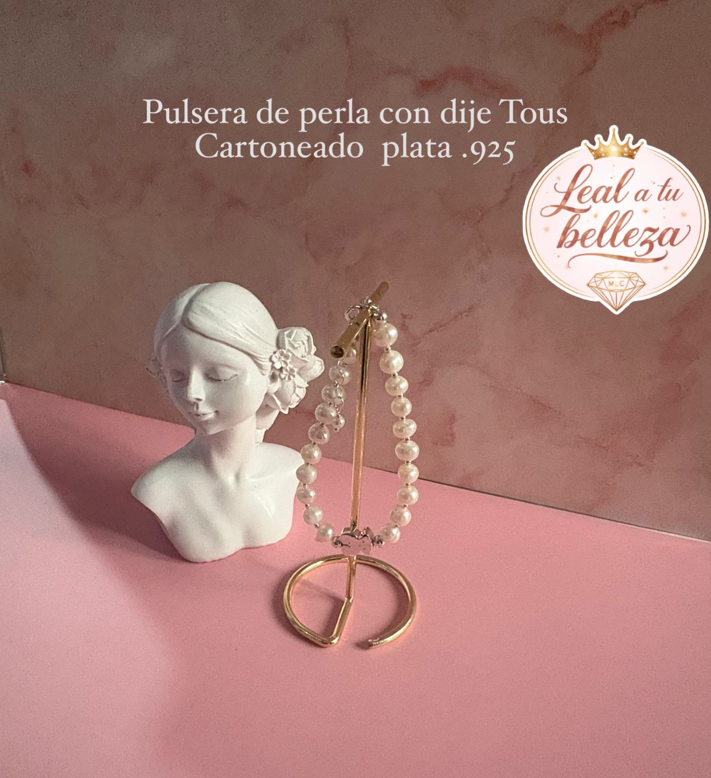 Pulsera de perla con  dije tous cartoneado